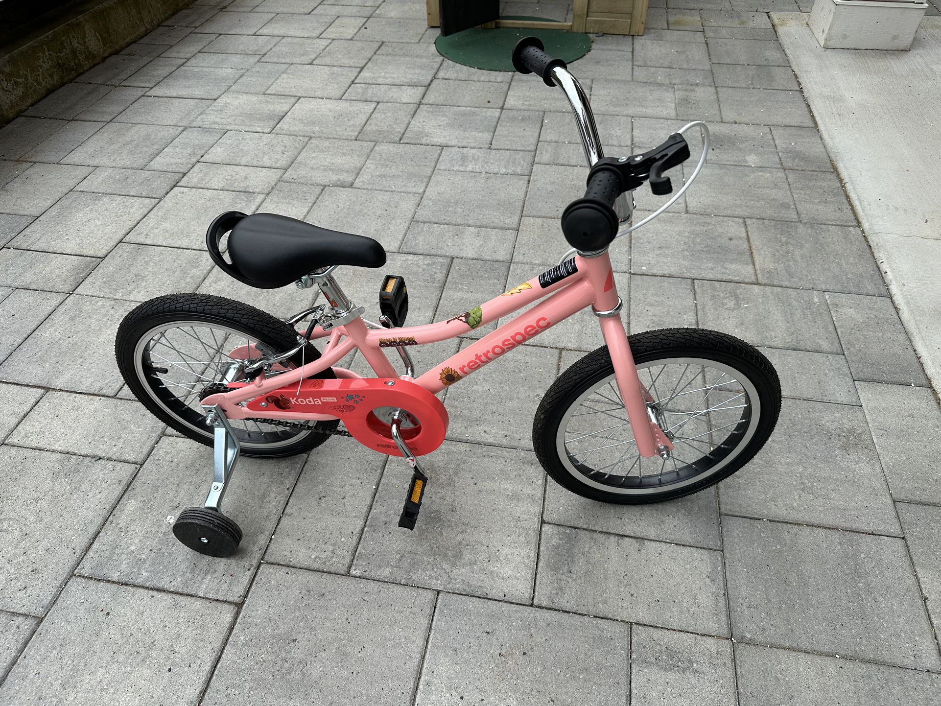 Pink kids Retrospec bike