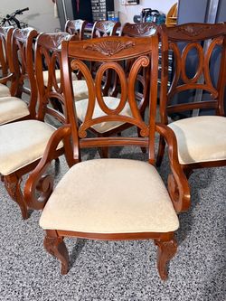 Set of Carved Wood Dining Chairs
