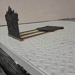 Antique bronze book holder