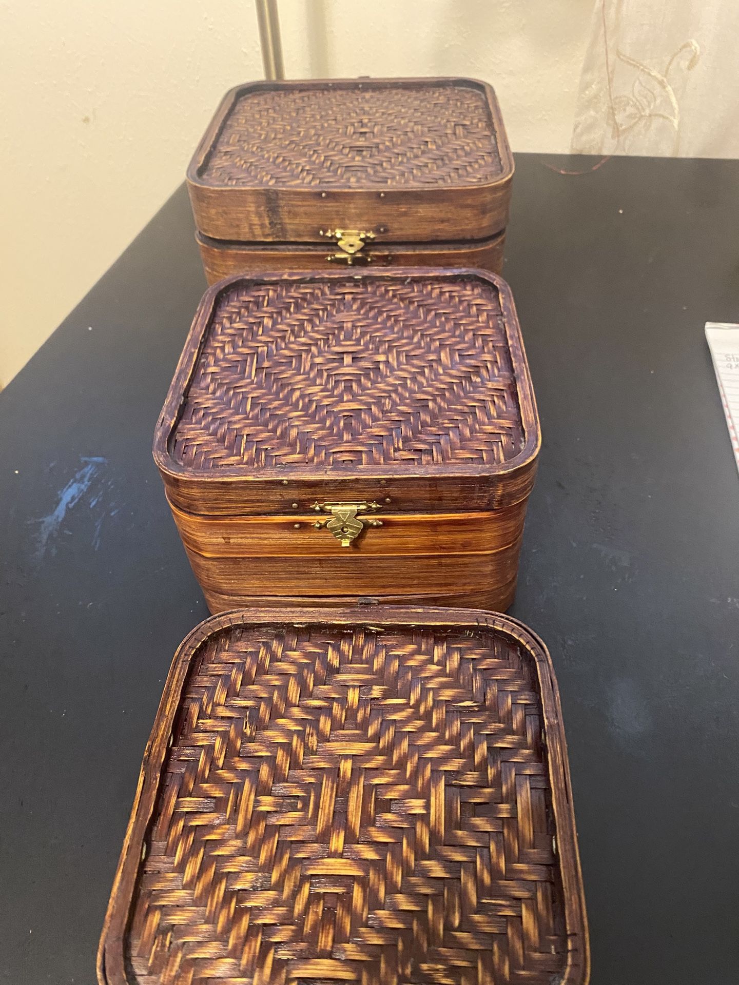 Three stackable wicker basket/containers