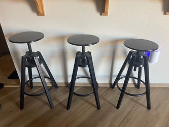 3 adjustable bar stools Sold as a package.