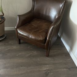 Two Leather Chairs 