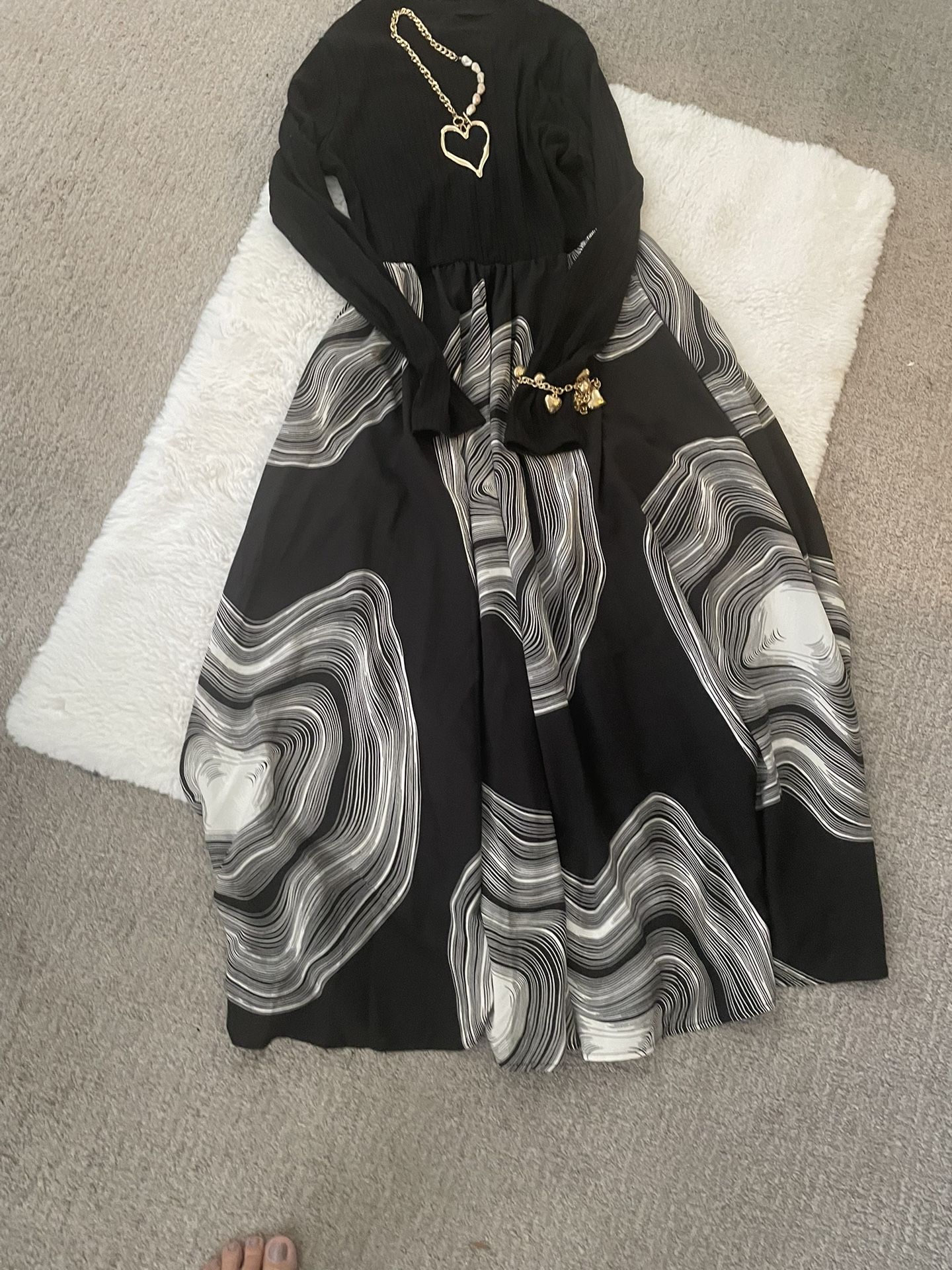 Elegant black and white long dress – modern art-inspired design!"