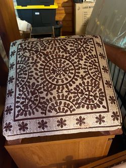 2 embroidered foot stools