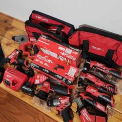 Milwaukee M12 (10) Tool, (1) battery, (1) charger, (2) carry bag combo