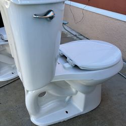 Toilet in good condition and clean, measures 17inches high
