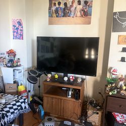 50 in Roku Smart TV + TV Stand