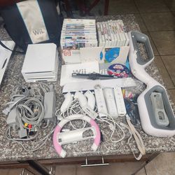 Two WII'S and 26 Games
