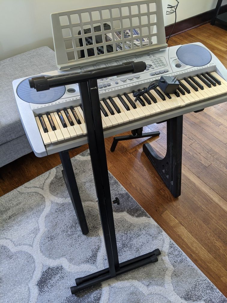Yamaha PSR-275 piano + two stands.
