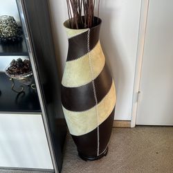 Leather covered vase