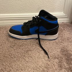 Blue And Black Air Jordan’s.
