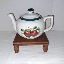 Vintage apple design teapot. Casuals