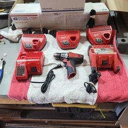 Milwaukee Chargers (5) And  3/8s Drill Driver