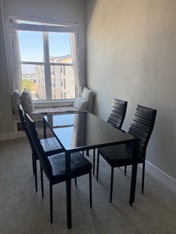 Glass dining table for 4 person