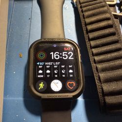 Apple Watch Series 7 Cellular with assortment of straps