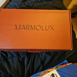 A bathroom stand for toilet paper