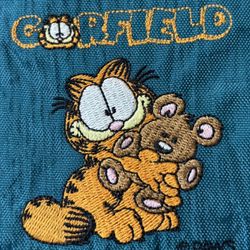 Garfield the Cat Green Fabric Pencil Pen Accessory Zipper Pouch with Garfield hugging a teddy bear sewn patch 3 Ring Binder Holes Vintage