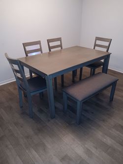 Made of ashley furniture gray big table