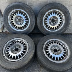 Chrome BMW style two 15 inch Aluminum wheels with old tires