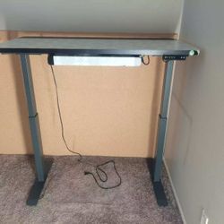 TA Nikoda Electric Adjustable Standing Desk + Black Height‑Adjust Chair – $140