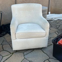 Katrina Beige Swivel Gloves Chair (Living Spaces)