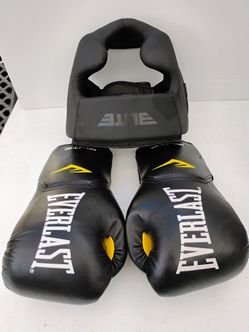 Elite a full face protector head guard and Everlast synthetic leather training gloves .
