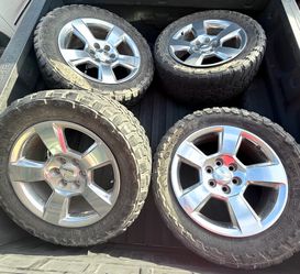 Chevy  Oem 20s Wheels On Toyo MT 33s Tires.