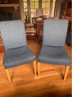 2 blue fabric dinning room chairs