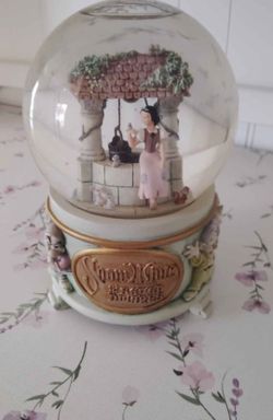 Snow white collectors item snow globe in pristine condition