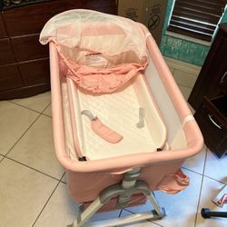 pink bassinet 