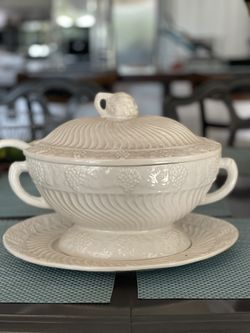Punch or gravy bowl with ladle.