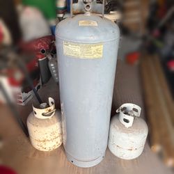 3 Empty Propane Tanks