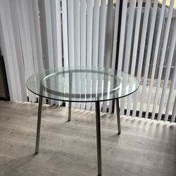 Glass Top Dining Table With Stainless Steel Leg