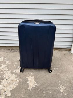 Ricardo medium expandable/ spinner luggage