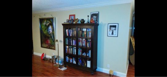 crate and barrel bookcase and side table