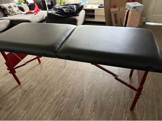 Massage table