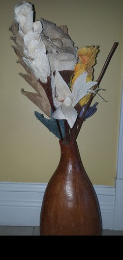 Wooden vase with flowers