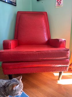 Orange high back retro vinyl chair