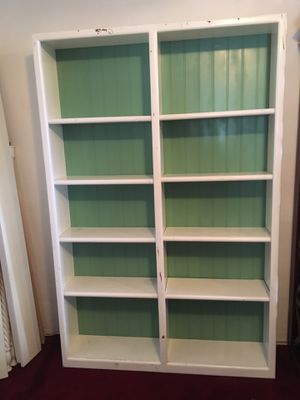 Photo Nice white & seafoam green shelf. Can be used as a bookshelf, book cabinet, storage shelf. Great for little girls room or storage in the garage.