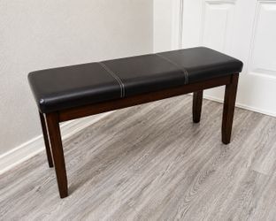 Dark wood bench