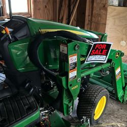 John Deere 1025R Tractor with bucket 