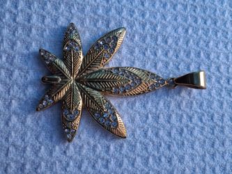 Gold- Toned, texture cannabis leaf pendant
