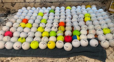 50 used golf balls