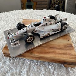 Die-Cast  model of 1:18 IndyCar, specifically identified as a UT Models Hogan..