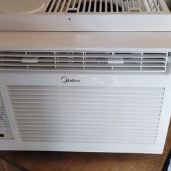 Mideast 5000 BTU year old window air conditioner on