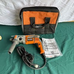 RIDGID R5011 corded electric hammer drill made by RIDGID LIKE NEW 1/2" hammer drill 8.5 Amp 2-speed, up to around 3000 RPM 1/2" keyed chuck Auxiliary/