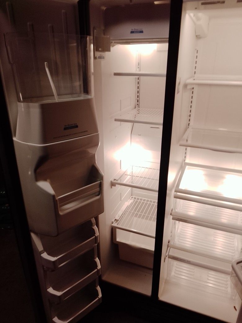 black stainless steel refrigerator side by side