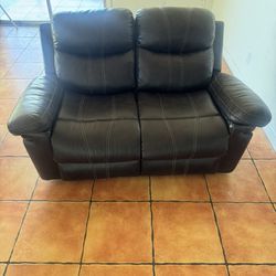 leather couch with reclining seats