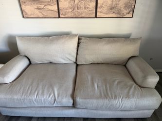Very comfy couch and love seat with ottomon
