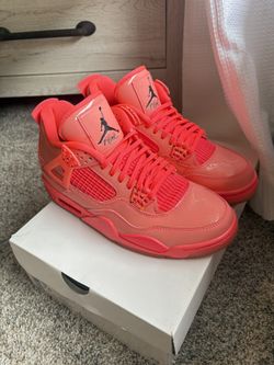 Woman’s Air Jordan 4 Retro Hot Punch Size 7.5 WITH THE BOX